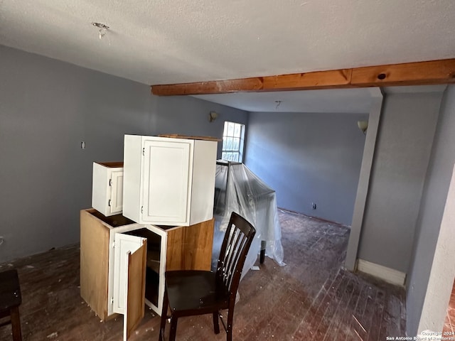 interior space featuring a textured ceiling