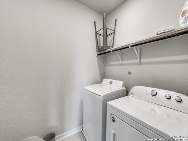 laundry room with independent washer and dryer