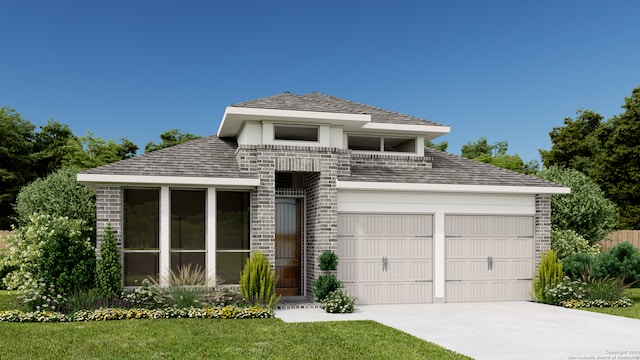 view of front facade featuring a garage and a front lawn