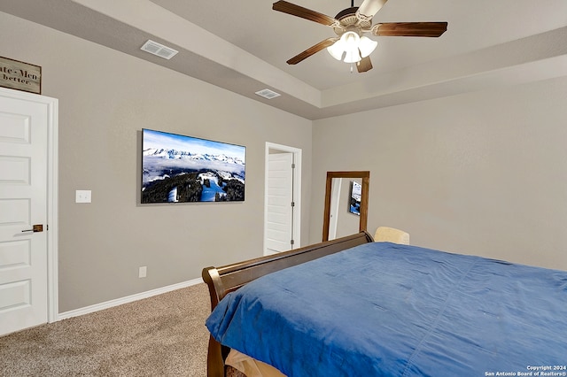 carpeted bedroom with ceiling fan