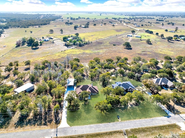 birds eye view of property featuring a rural view