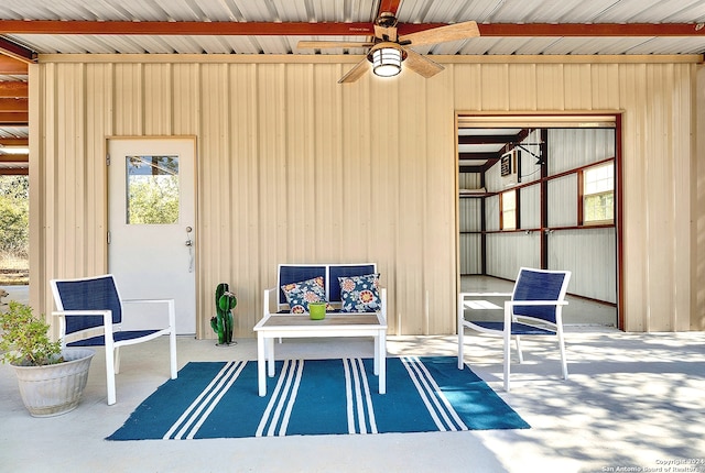 view of patio / terrace featuring ceiling fan