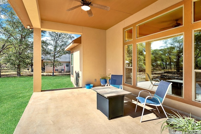 view of patio with ceiling fan