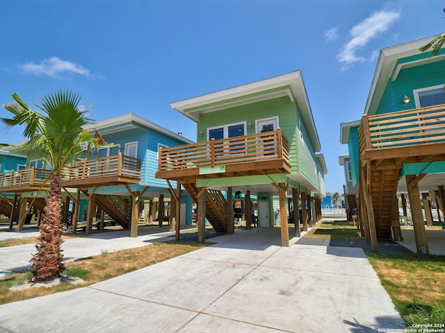 coastal home featuring a carport