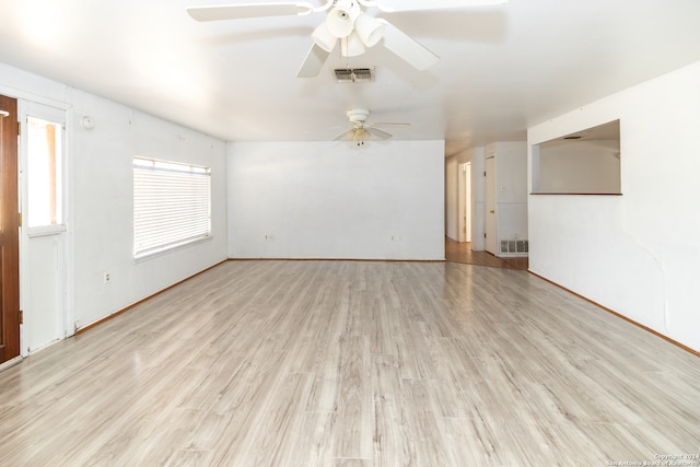 unfurnished living room featuring light hardwood / wood-style floors and ceiling fan