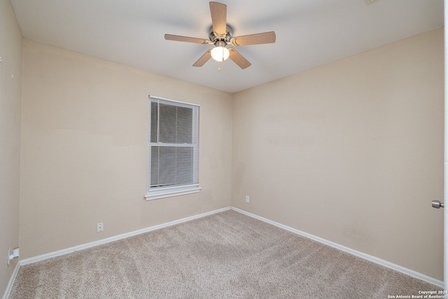 unfurnished room featuring light carpet and ceiling fan