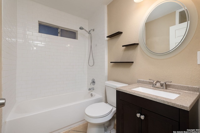 full bathroom with vanity, toilet, and tiled shower / bath combo