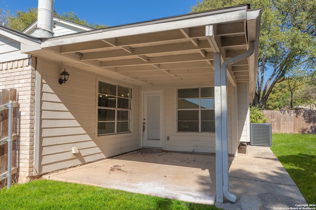 property entrance featuring a patio area