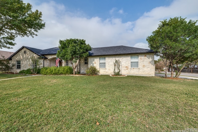 view of front of home with a front yard