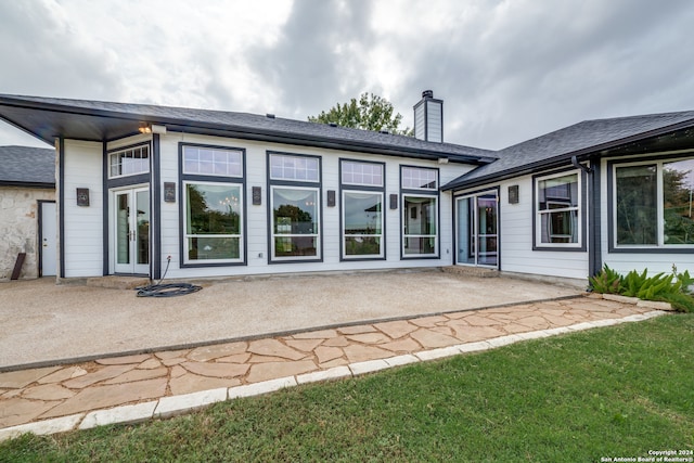 rear view of property with a patio