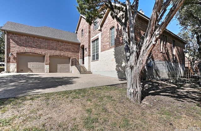 view of property exterior with a garage