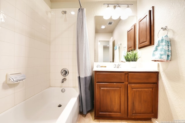 bathroom with vanity, tile patterned floors, and shower / bathtub combination with curtain