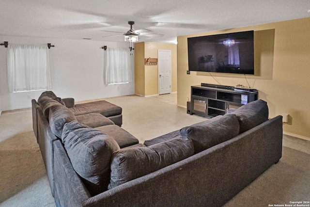 living room featuring ceiling fan and light colored carpet