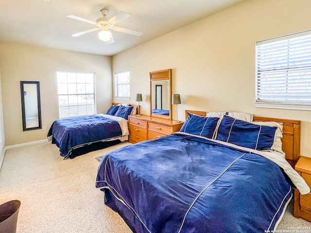 bedroom featuring carpet flooring and ceiling fan