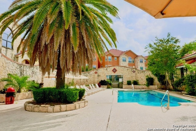 view of pool with a patio