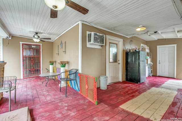 interior space featuring ceiling fan