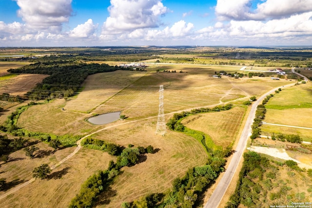 birds eye view of property featuring a rural view