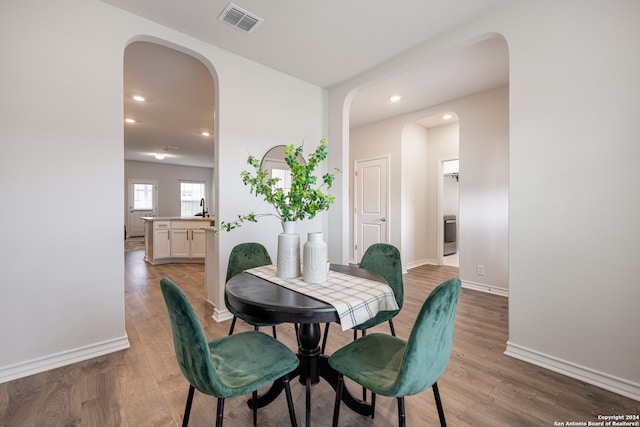 dining space featuring hardwood / wood-style flooring