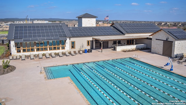 view of pool with a patio