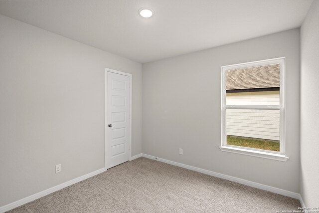 view of carpeted spare room