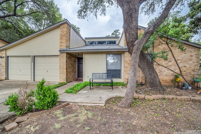 view of front of property featuring a garage