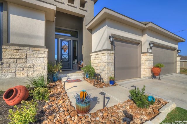 property entrance with a garage