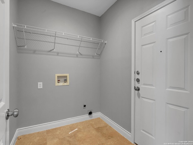 washroom featuring washer hookup, electric dryer hookup, and tile patterned floors