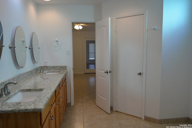 bathroom with vanity, ceiling fan, and tile patterned floors