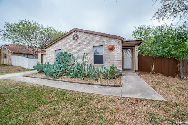 view of front of property with a front lawn