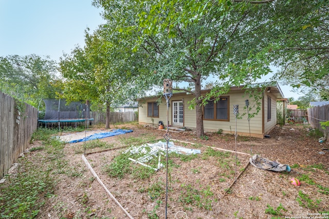 view of yard with a trampoline