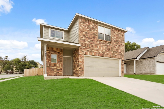 front facade featuring a garage and a front yard