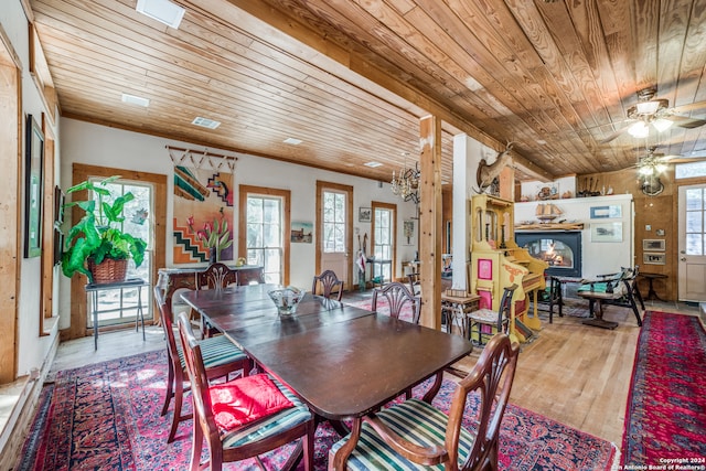 dining space with wooden ceiling, ceiling fan, and light hardwood / wood-style flooring