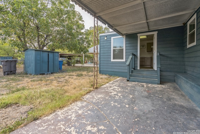 property entrance with a patio area