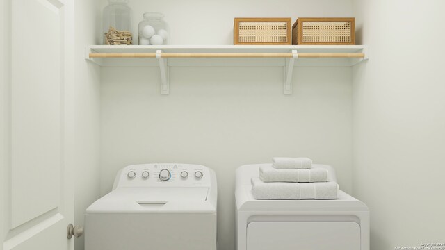 laundry room with washing machine and dryer