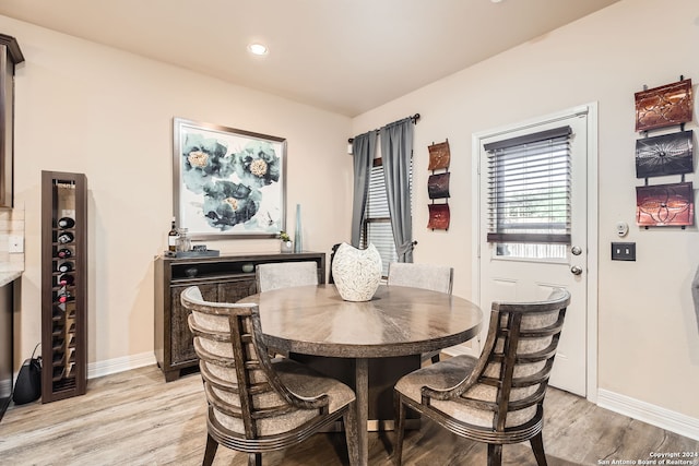 dining area with light hardwood / wood-style flooring