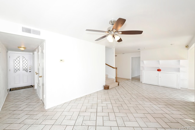 empty room featuring ceiling fan