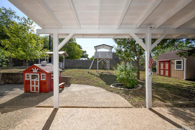 view of patio / terrace featuring a shed