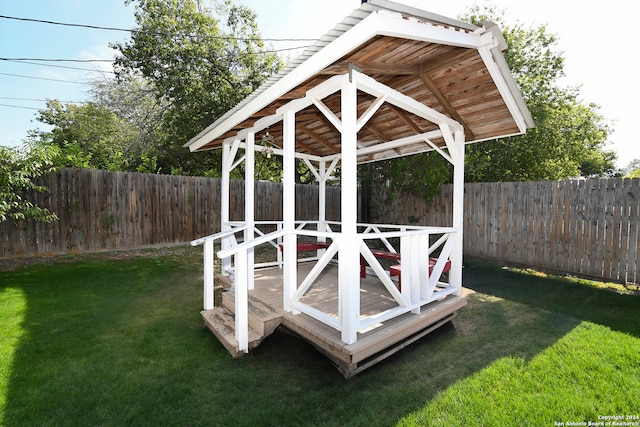 view of outbuilding featuring a lawn