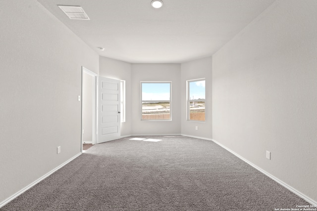 unfurnished room with carpet