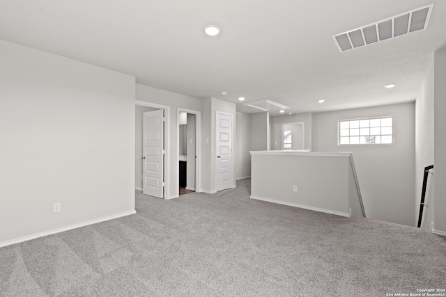 basement with light carpet