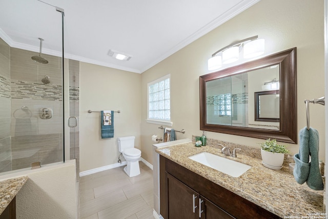 bathroom with ornamental molding, vanity, toilet, and a shower with shower door