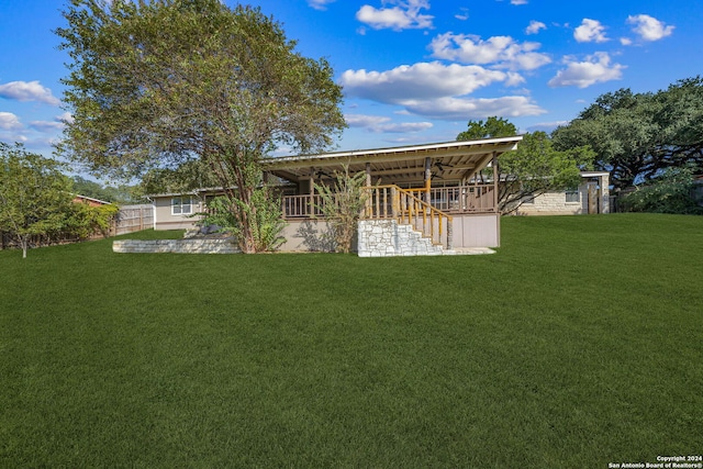 back of house featuring a yard