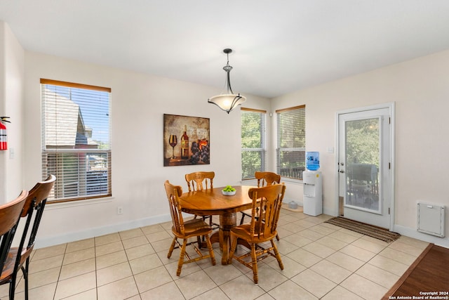 dining room with light tile patterned flooring