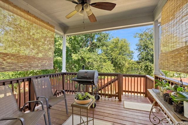 deck featuring grilling area and ceiling fan