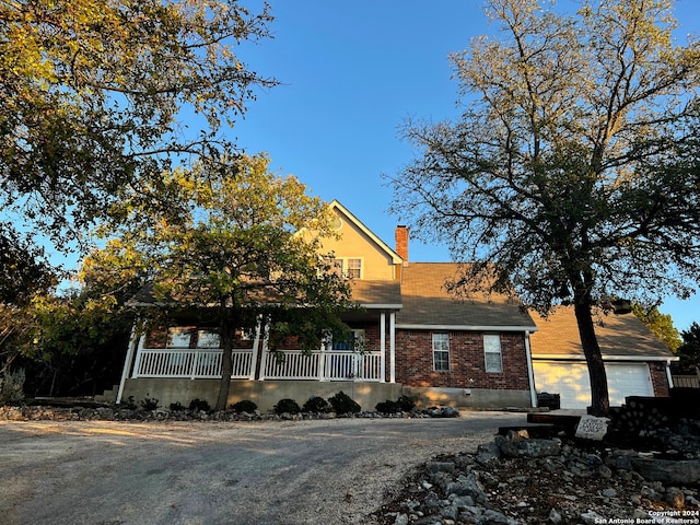 view of front of property featuring covered porch