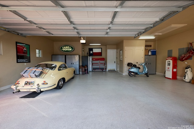 garage featuring a garage door opener