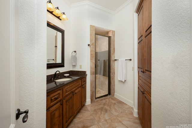 bathroom featuring walk in shower, vanity, and ornamental molding