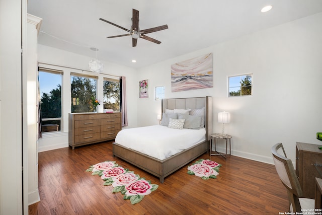 bedroom featuring dark wood-type flooring and ceiling fan