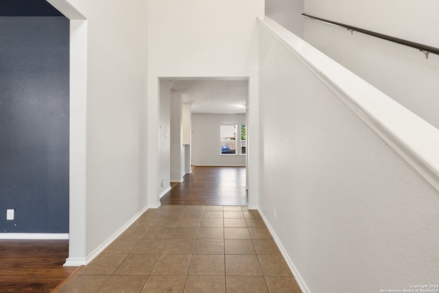 hall featuring dark wood-type flooring