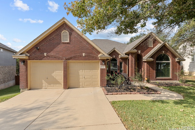 front facade with a garage